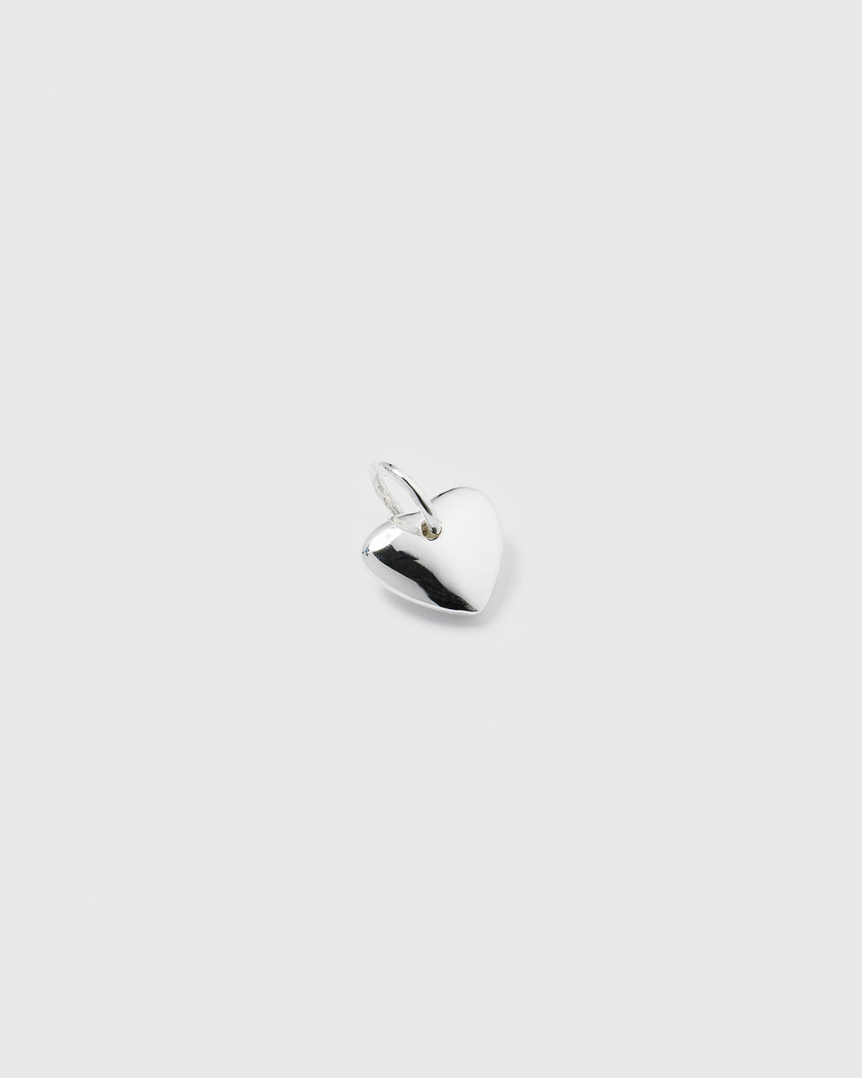 A product shot of the Beloved Heart Pendant in silver, showing the small, polished heart-shaped charm.