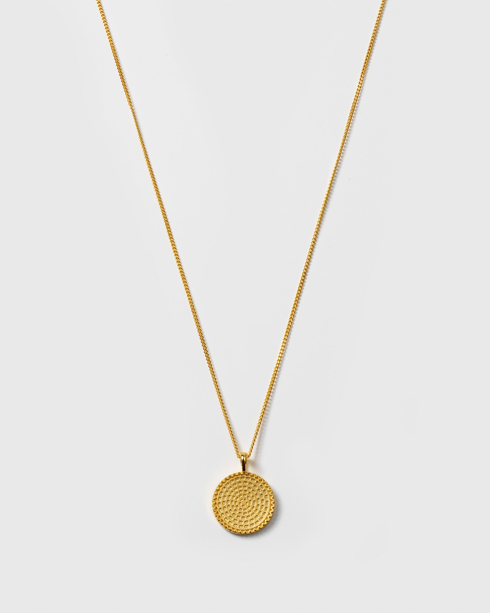 A product shot of the Lucky Coin Heal Necklace in gold, featuring a fine chain and a round pendant with an intricate sun pattern.