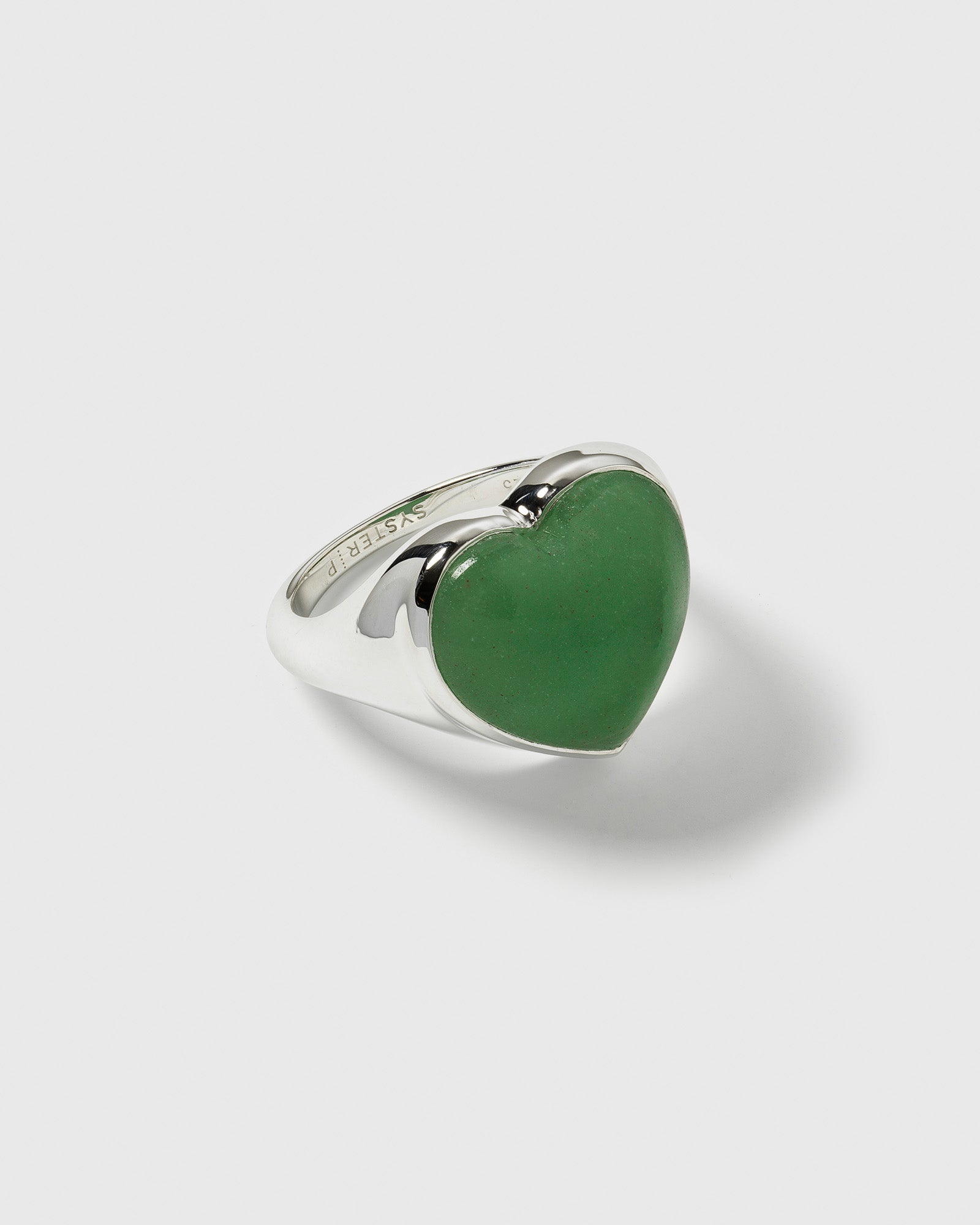 A close-up of the La La Love Big Heart Ring in silver, showcasing the large green jade heart stone.