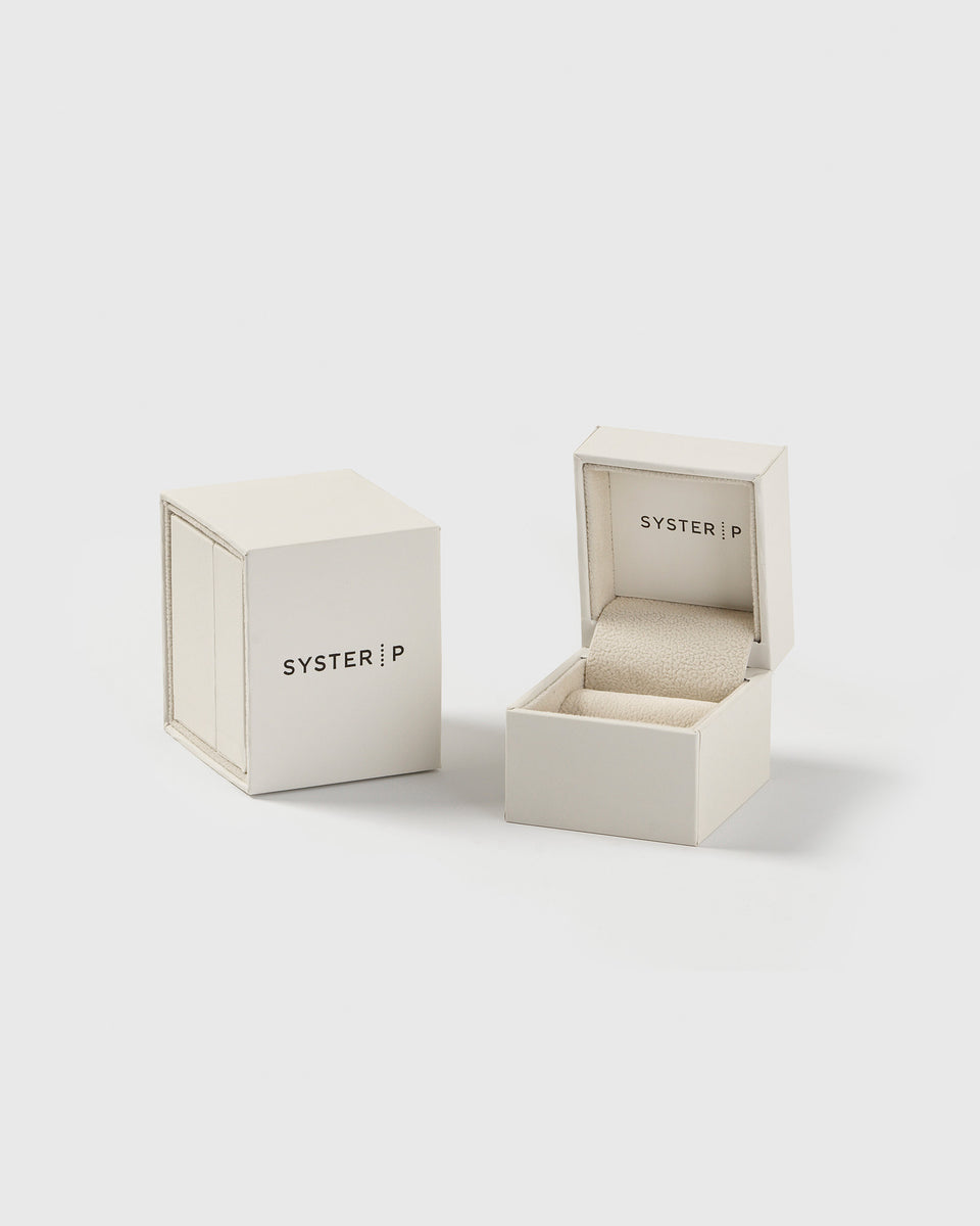 The exclusive Syster P jewelry box shown open and closed.